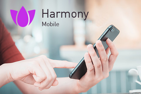 Harmony Mobile logo with hand and mobile phone