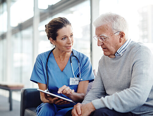 Healthcare Security - Image of doctor and patient - carousel 1