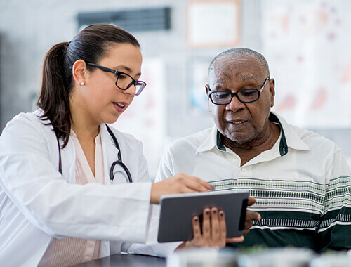 Healthcare Security - Image of doctor and patient - carousel 4